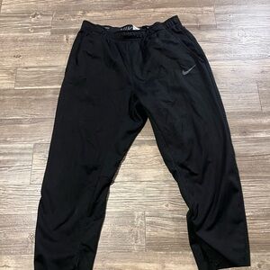 Nike Black Sweatpants with Elastic Waistband and Tapered Fit